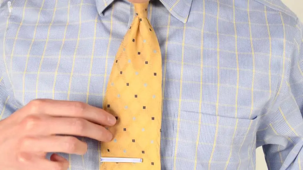 Preston's yellow tie with blue squares