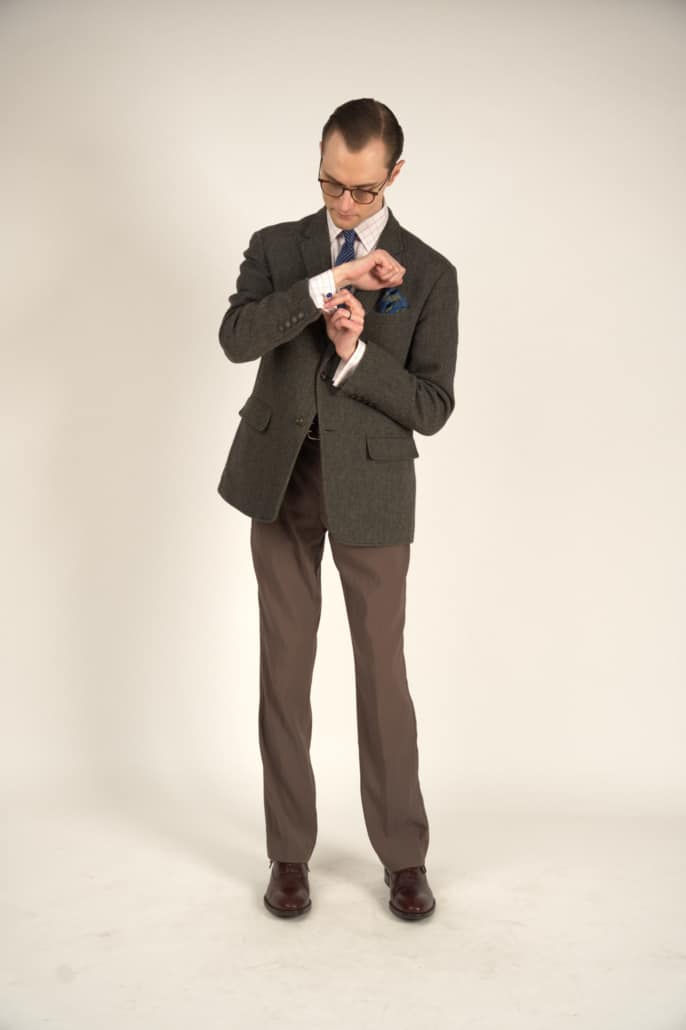 Preston in a business casual outfiit