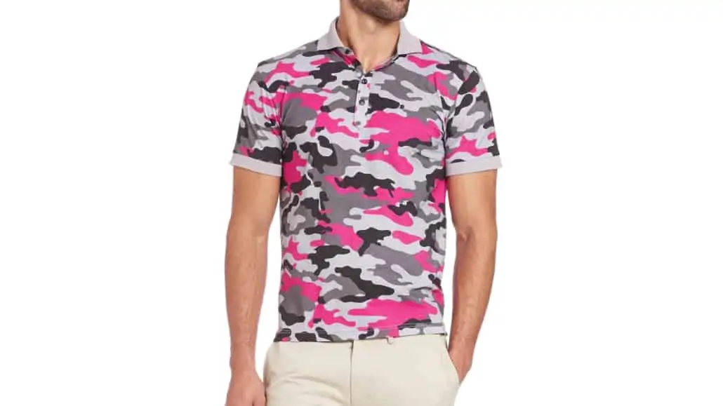 A man wearing a pink camouflage polo shirt.