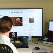 Preston And Raphael In Front Of Computer Preston and Raphael sitting in from of a computer checking The New York Times website.