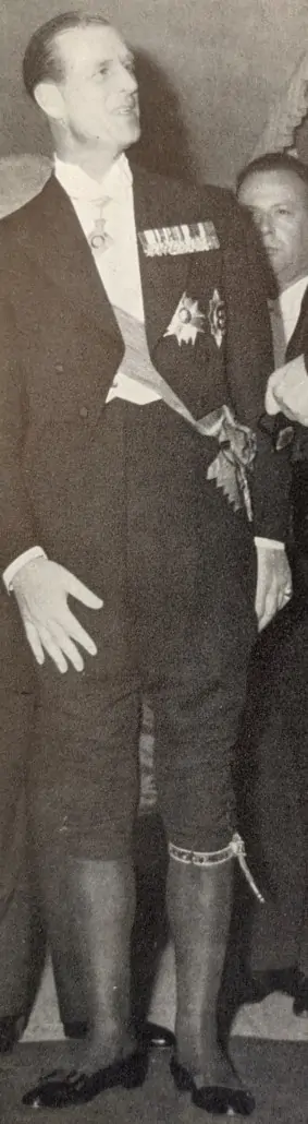 Prince Phlip the Duke of Edinburgh wearing white tie with silk socks, opera pumps and breeches