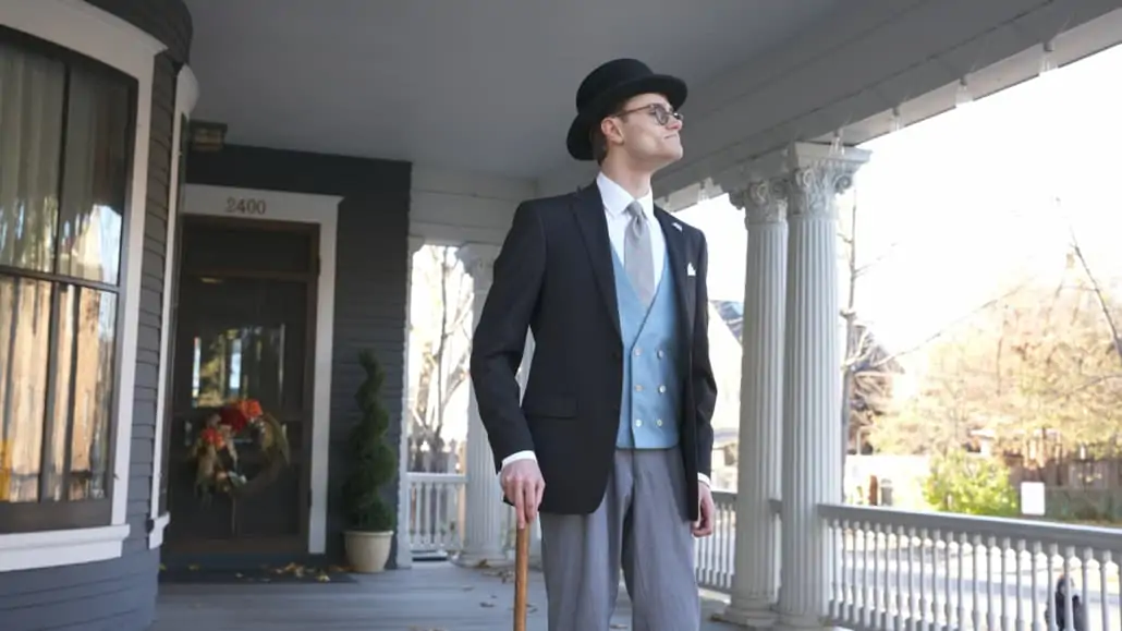 Preston wearing a stroller suit and a bowler hat. 