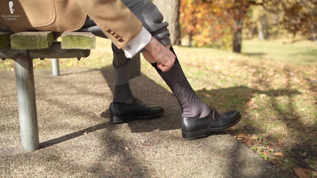Preston wearing the two-tone socks from fort Belvedere