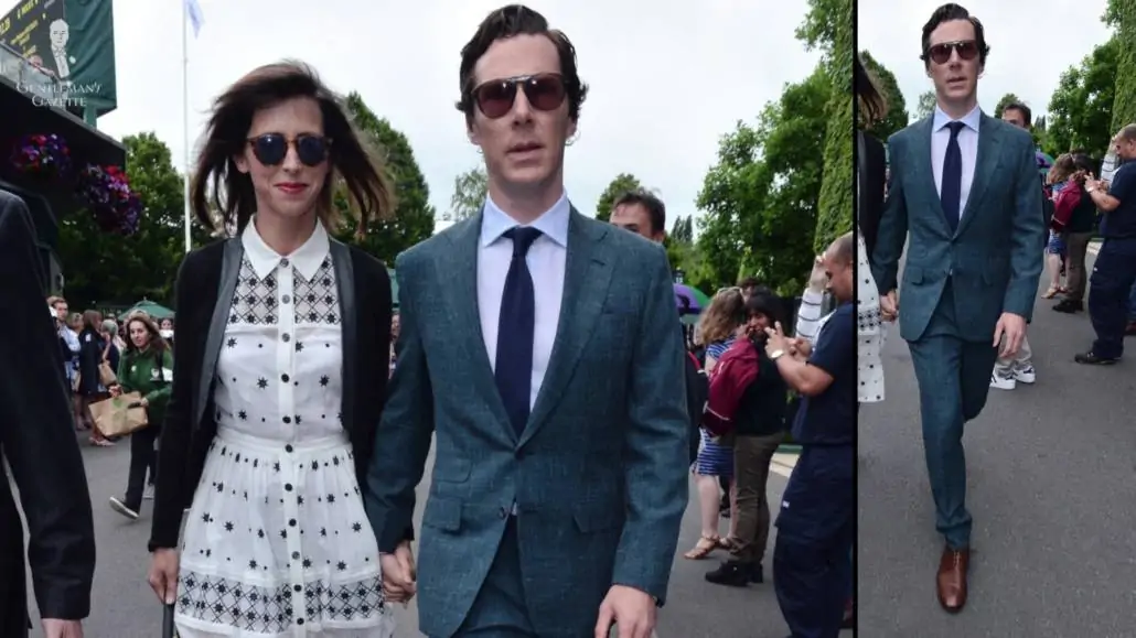 Benedict Cumberbatch at Wimbledon wearing a green suit with slim lapels, a light blue shirt with a blue knit tie, and brown derby shoes.