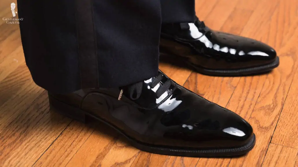 Patent leather evening shoes with evening laces. 
