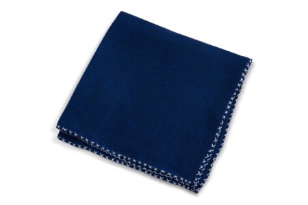 Dark Blue Linen Pocket Square with White Handrolled X Stitch by Fort Belvedere on white background