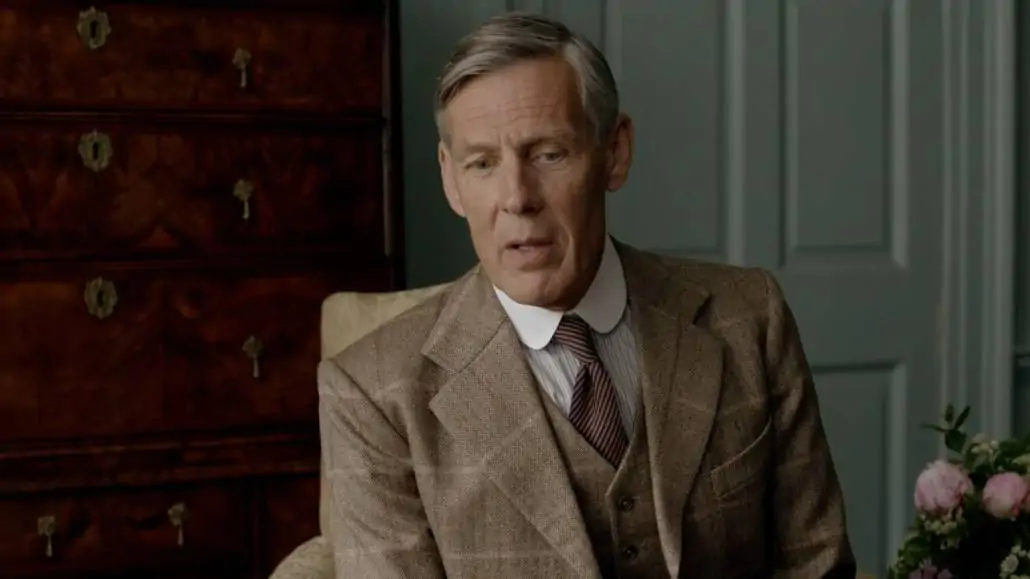 Downton Abbey Lord Merton wering a white shirt with rounded collars and wide lapels