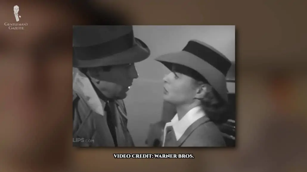 Humphrey Bogart and Ingrid Bergman wearing Borsalino hats in a scene from the classic film Casablanca. 
