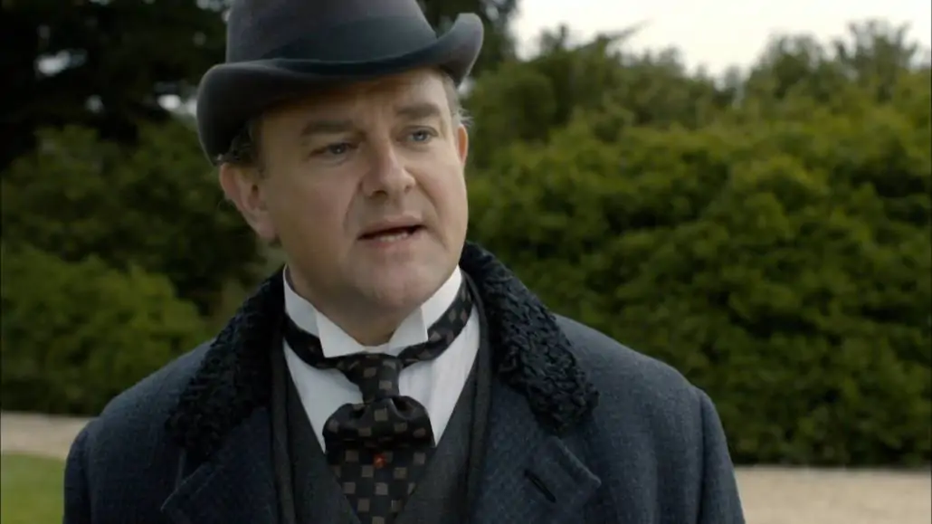 Lord Grantham showing his stiff, starched, and detachable shirt collar