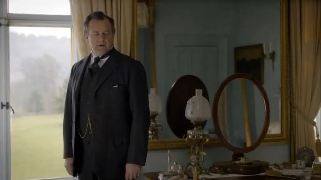 Lord Grantham with undone bottom waistcoat button