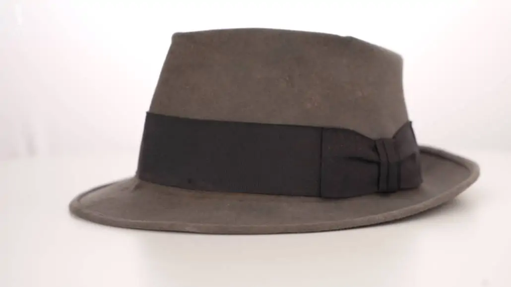 This charcoal fedora features a subtle Cavanagh edge on its brim.
