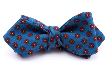 Wool Challis Bow Tie in Mohair Blue with Red and Yellow Pattern by Fort Belvedere ties on white background
