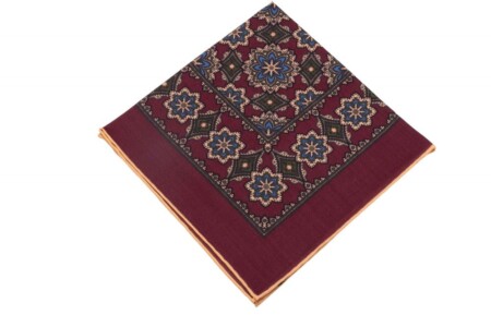 Burgundy Red Silk Wool Pocket Square with Printed geometric medallions in olive green, light blue, cream and orange with beige contrast edge by Fort Belvedere