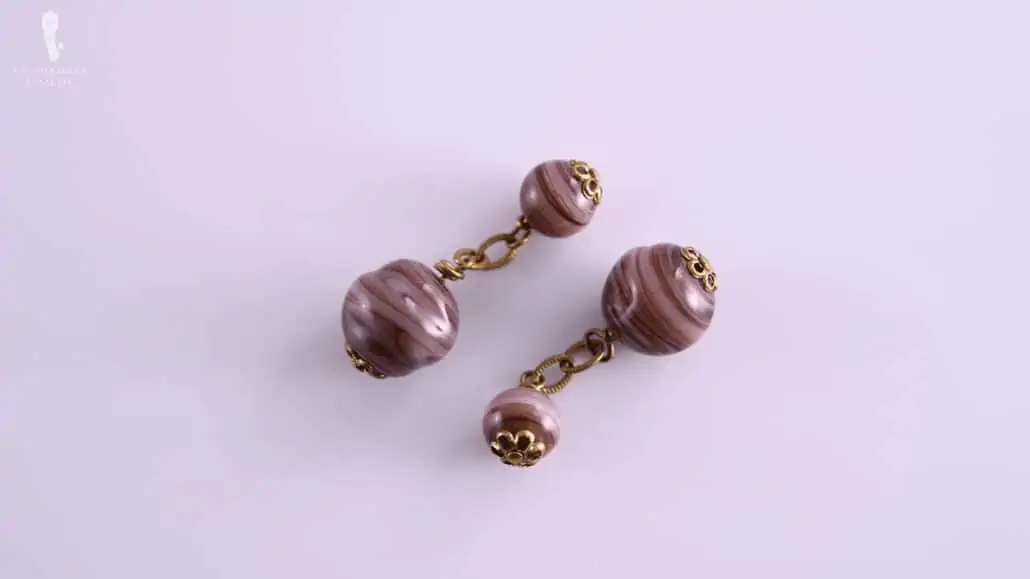 Purple swirl double-sided glass ball chain cufflinks.