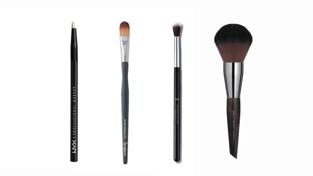 Essential Makeup Brushes; L-R: detail brush, flat brush, small fluffy brush, large powder brush