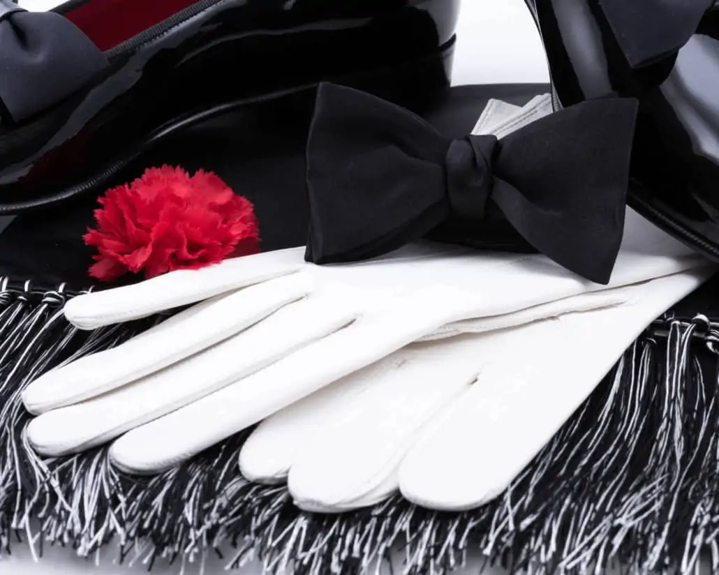 Black-Bow-Tie-in-Silk-Satin-with-Red-Carnation-Boutonniere-and-Evening-Scarf-in-Black-White-Silk-Satin-and-White-Unlined-Leather-Gloves