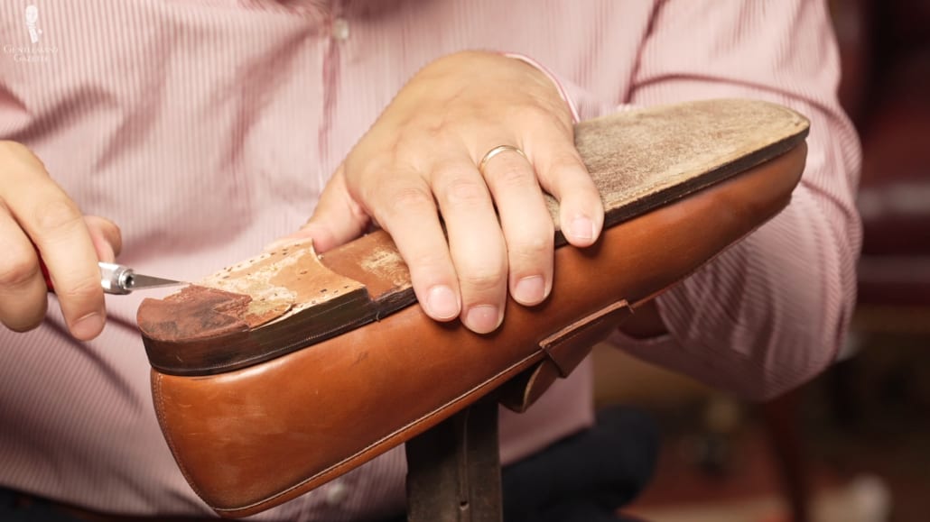 The RTW Lobb Paris shoe features a brown rubber heel cap.