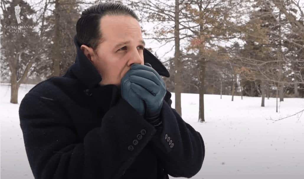 Raphael Wearing Black Jacket And Green Gloves Raphael keeping warm in the cold with a black overcoat and Petrol Blue gloves from Fort Belvedere
