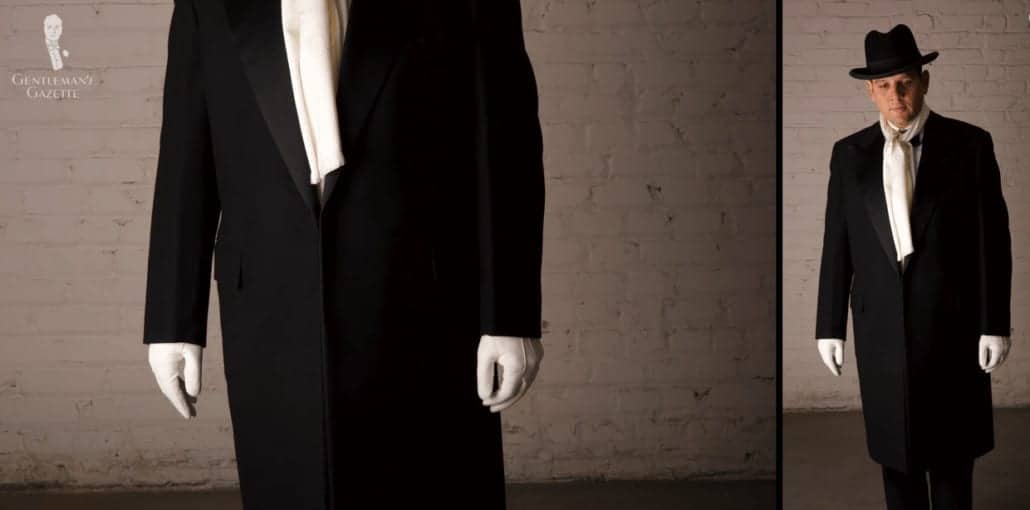 Raphael Wearing Evening Accessories. White Mens Evening Unline Leather Gloves From Fort Belvedere Raphael in black tie and outerwear, including an evening overcoat, black homburg, white scarf, and white lamb Nappa gloves.