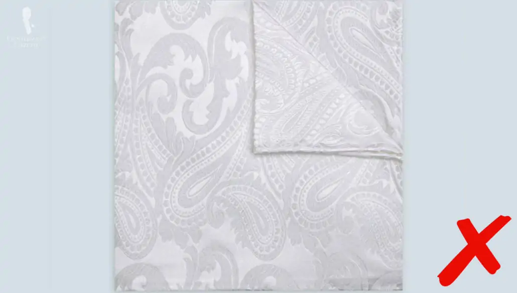 A white pocket square with large patterns would like a table cloth!