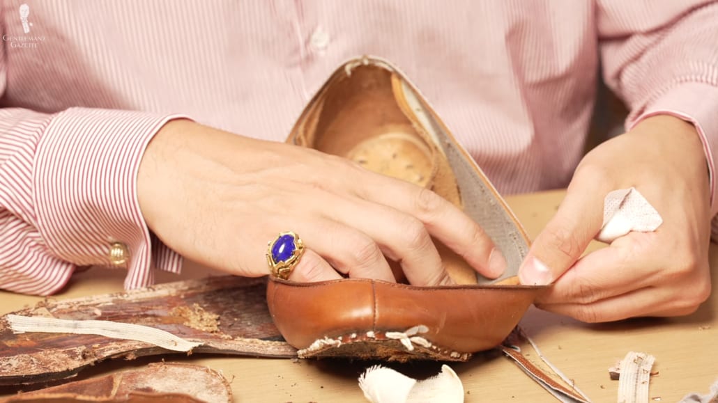 Raphael examines further fabric interlinings on the Lobb Paris shoe.