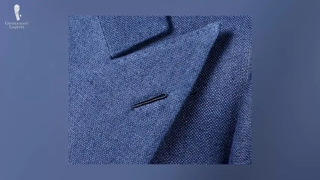 A Milanese buttonhole on a navy suit