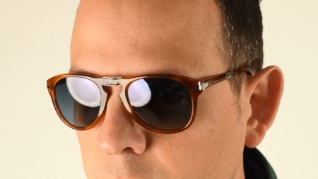 A pair of Persol sunglasses as worn by Raphael.