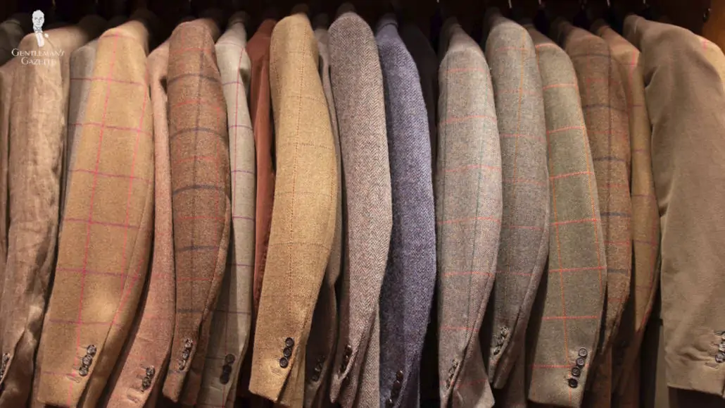 A rack of tweed jackets.