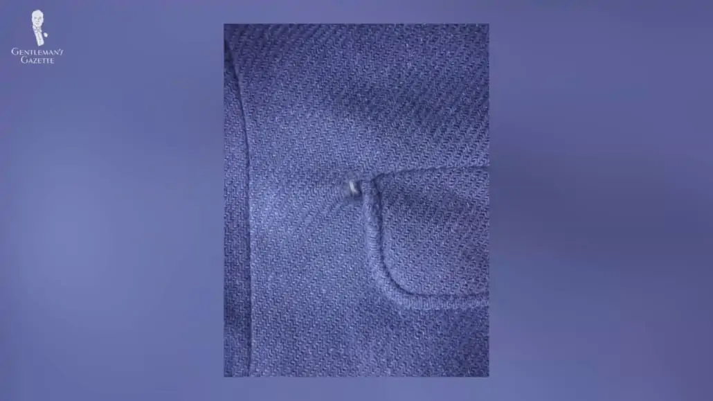 An example of an invisible mend done on a flap pocket.