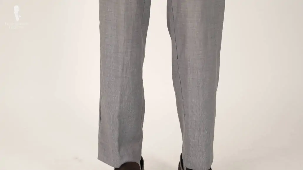 Gray trousers with extremely fine pattern weave.