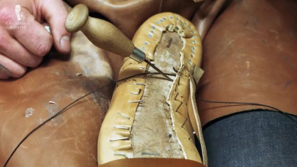 Nails hold the upper leather of a shoe in place during the hand-welting process.