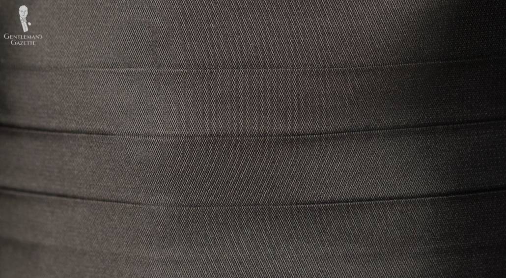 Pleats On A Cummerbund Up Close Pleats on a cummerbund up close