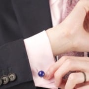 Preston showing the platinum-plated sterling silver eagle claw cufflinks featuring blue lapis lazuli stone from Fort Belvedere