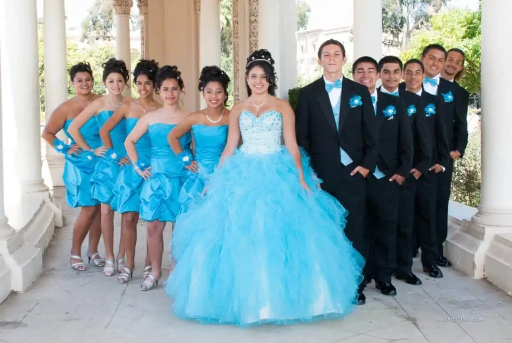 Quinceanera with tuxedos and matching colors for boys and girls - picture credit Rose Tuxedo