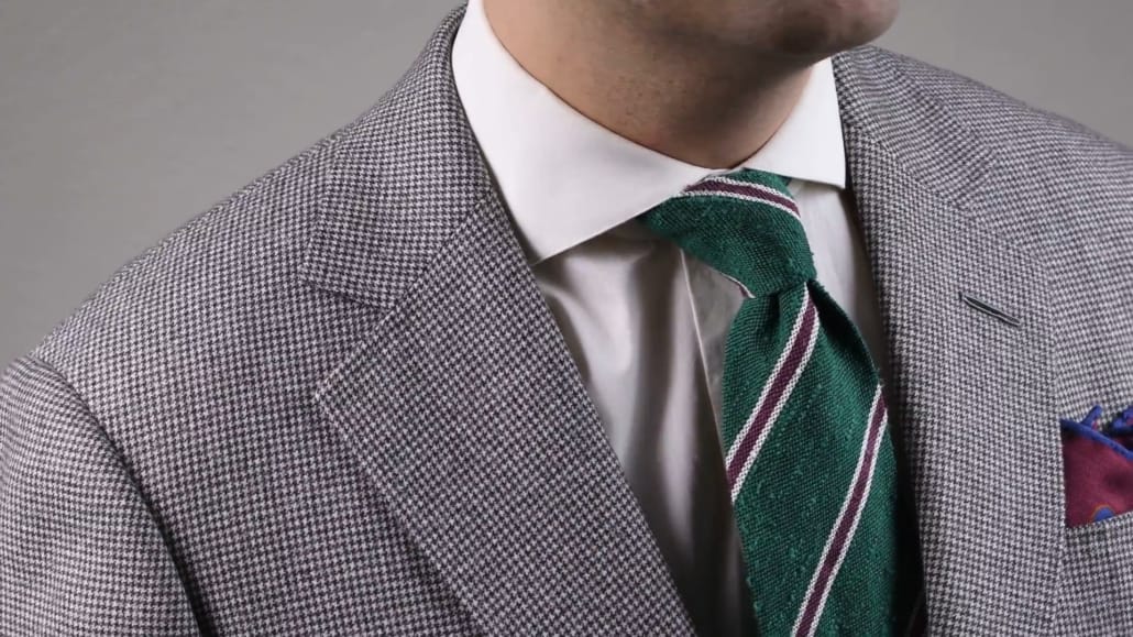 A textured Shantung Striped Green, Purple, and Cream Silk Tie from Fort Belvedere