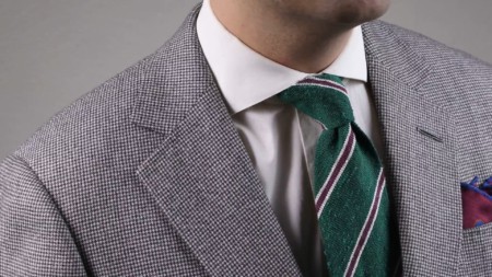 A gray suit worn with a textured Shantung Striped Green, Purple, and Cream Silk Tie from Fort Belvedere