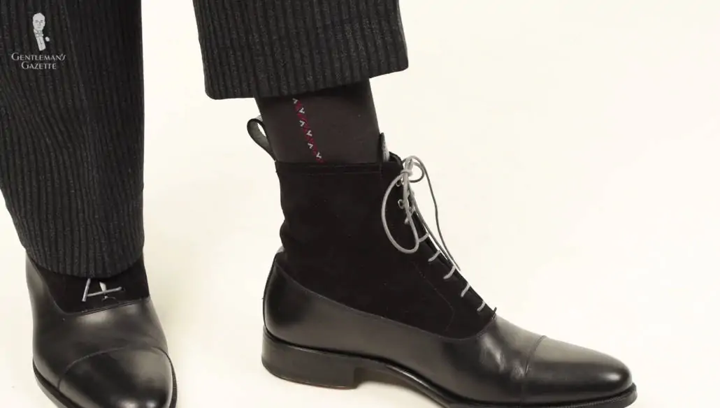 A pair of black chuka boots