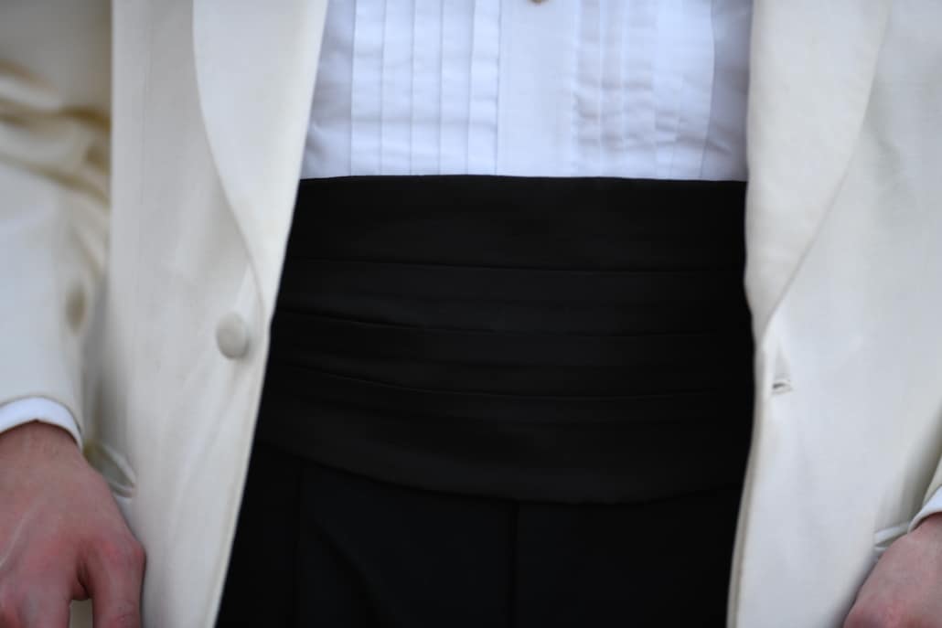 C A closer look at Preston's black satin cumemrbund