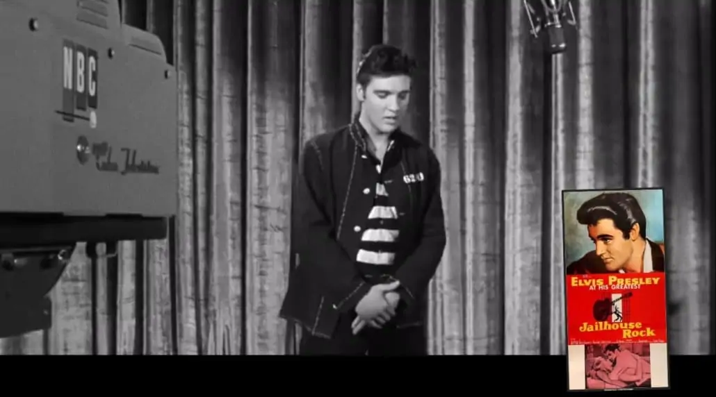Elvis Presley donning a dark denim jacket in the 1957 movie Jailhouse Rock