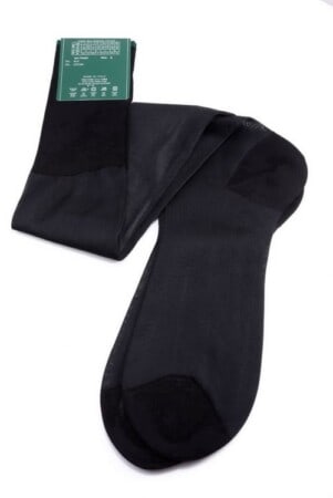A pair of black silk socks made by Fort Belvedere