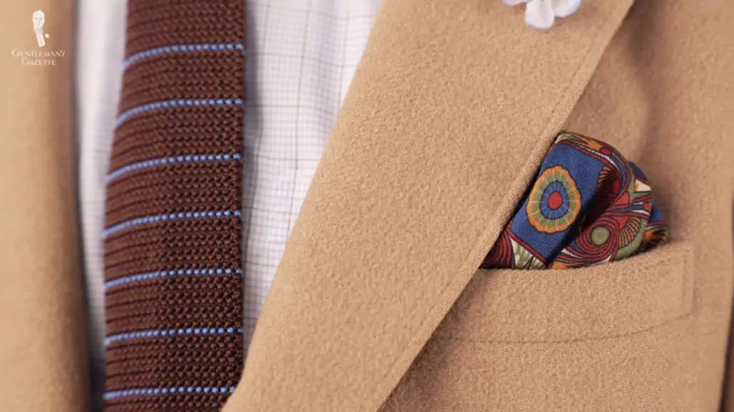 A jacket with a printed pocket square.