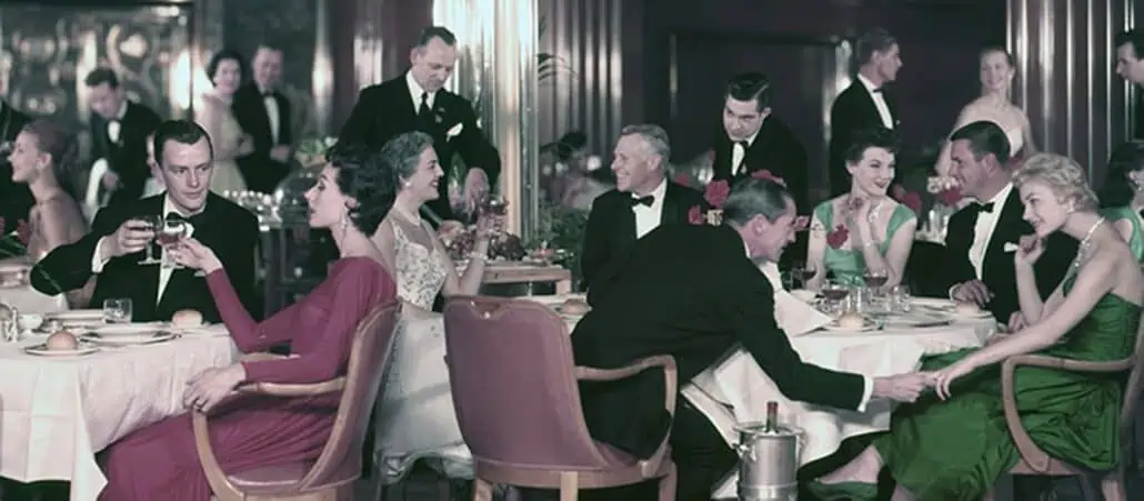 Queen Mary Dining in the 1950s - the slim bow ties give away the time period