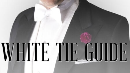 Photograph of the chest of a man wearing white tie with the title White Tie Guide displayed