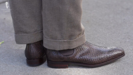 A pair of dark brown woven leather Chelsea boots from Carmina.