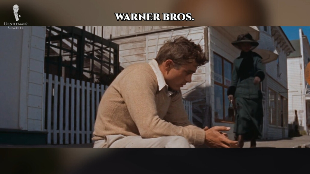 Dean in East of Eden wearing a buff-colored sweater with light trousers.