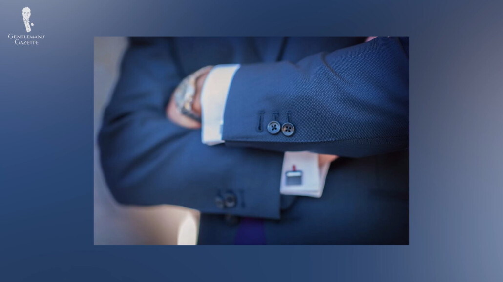 Many men would leave one of their cuff buttons undone to show that their suit is of high quality