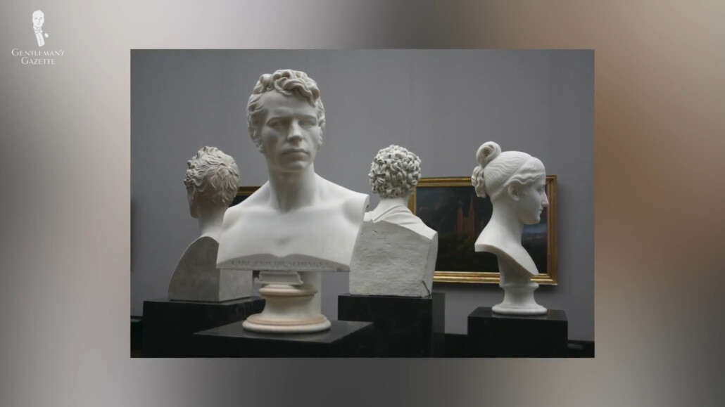 Men and woman head busts