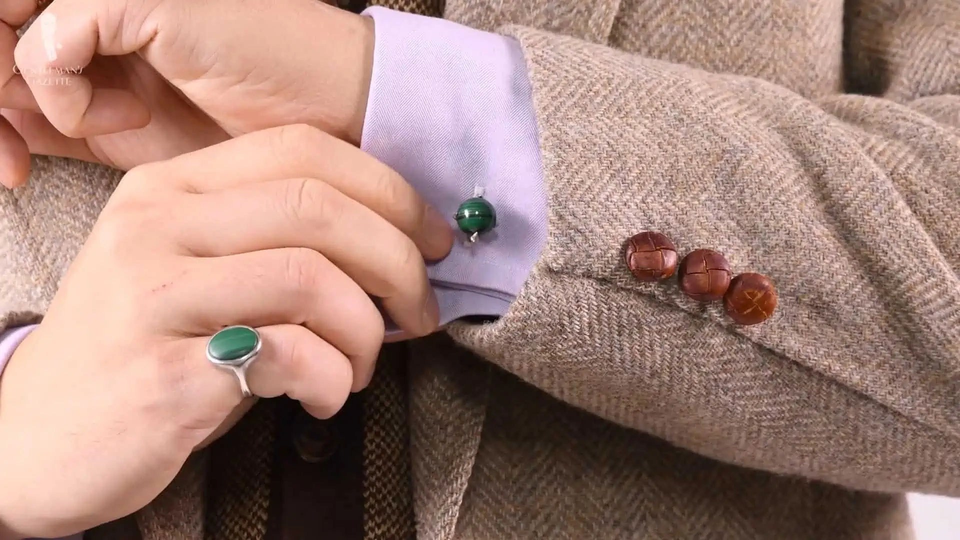 Raphael's silver Malachite pinky ring matched with the Eagle Claw Cufflinks with Malachite Balls from Fort Belvedere