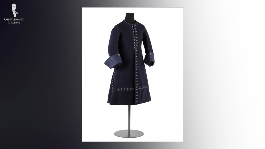 This 1660s frock coat has numerous buttons and turned-back cuffs.