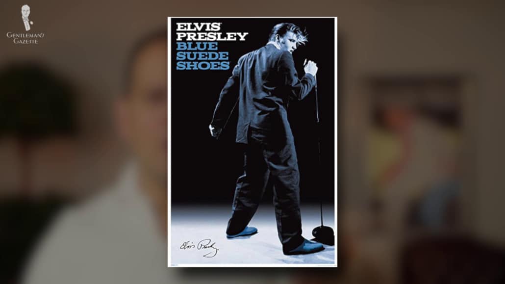 Elvis Presley wearing a pair of blue suede shoes.